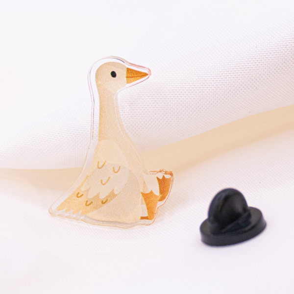 Pin de pato blanco