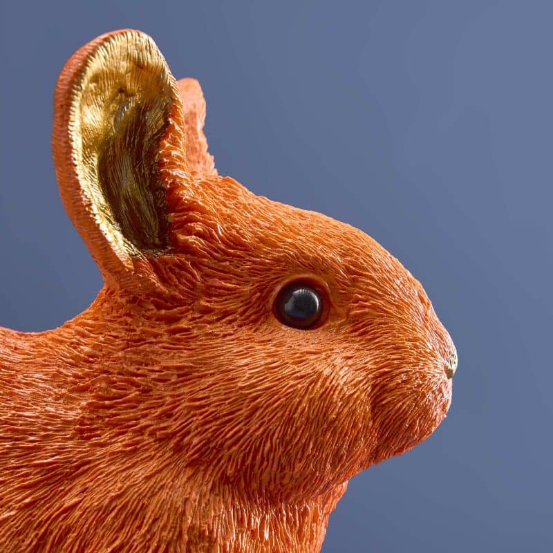 Thrifty rabbit, orange polyurethane resin, 21 x 11 x 16 cm