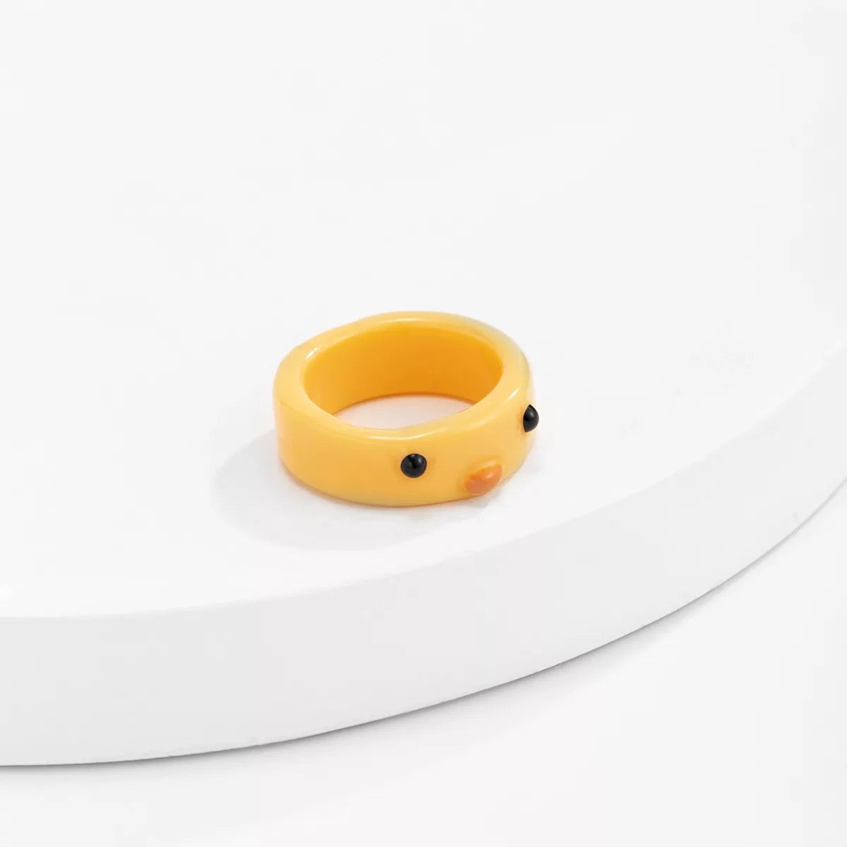 Anillo de pato amarillo