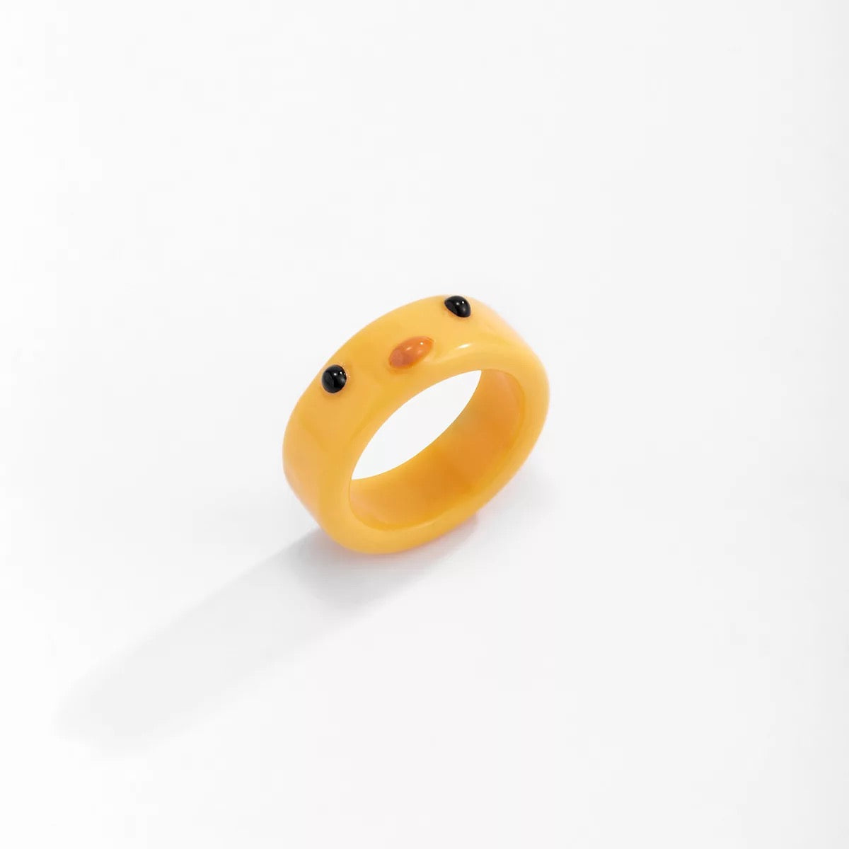 Anillo de pato amarillo