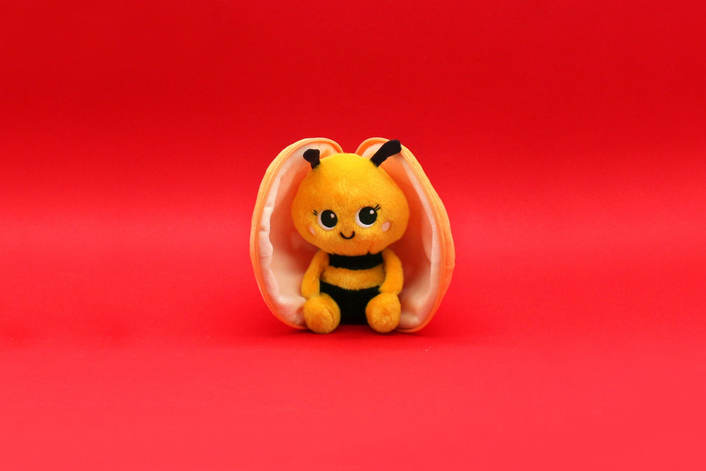 Peluche réversible Buzzet l'abeille/mandarine – Flipetz