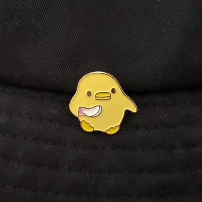Pin’s Canard Jaune avec Couteau – visuel produit