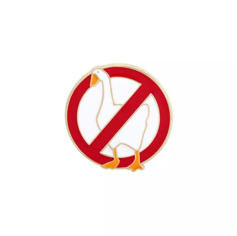 Pin de "No se permiten patos"