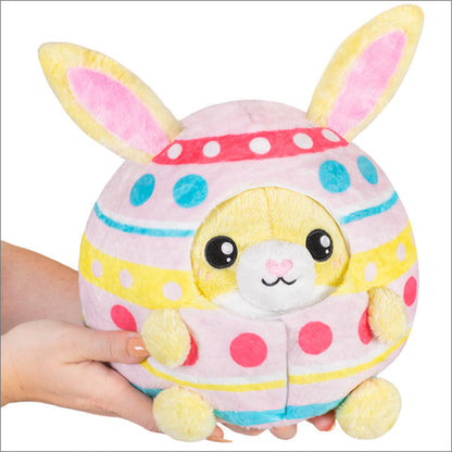 Peluche Undercover Squishable – Lapin dans un Œuf de Pâques